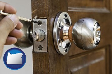 a locksmith and a door lock - with Oregon icon