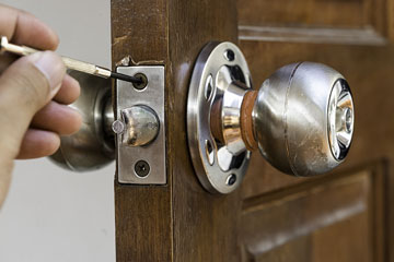 a locksmith and a door lock